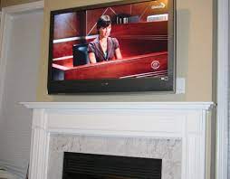 First, you'll need to consider the height of the fireplace. Diy Installing 46 Inches Lcd Tv Above The Fireplace And Patching The Niche Diyable Com