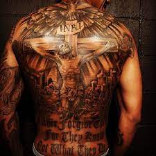 Nick cannon s tattoo nice back piece nick cannon tattoo. Nick Cannon S 3 Tattoos Their Meanings Body Art Guru