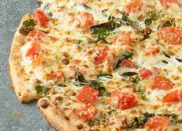 fresh spinach tomato alfredo pizza