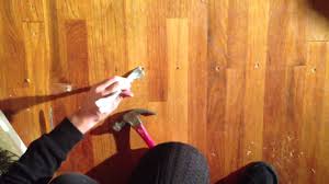 how to remove nails from hardwood floor