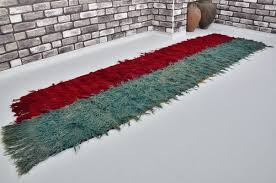 burgundy pompom kilim runner rug