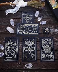 Eerie and macabre, these cards will add a feeling of mystery to your readings. A Black And Gold Foil Tarot Deck Printed On Black Plastic And Independently Published Comes With Companion Tarot Apps F Golden Thread Tarot Tarot Decks Tarot