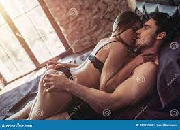 Couple having sex on bed stock photo. Image of female - 95315984