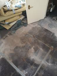 is sheet vinyl ok over asbestos tiles