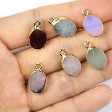 whole oval gemstone charm for