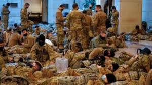 The whole point of the picture is that they're sleeping in the capitol due to ongoing threats of violence. Impeachment National Guard Sleep In Us Capitol Building Cbbc Newsround