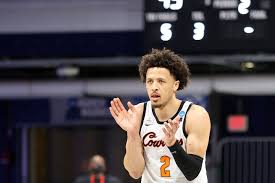He was in a white hoodie and light denim jeans while wearing a black medical mask. Nba Fans Watched Ncaa Mbb Tournament For Cade Cunningham Scouting Bullets Forever
