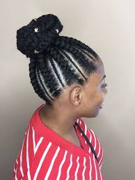 Pull the top half of your hair into a braided bun for a cute relaxed look. Black Hair Braided Bun Novocom Top