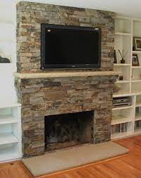 stone fireplace designs with tv above