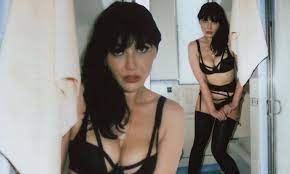 Daisy Lowe shows off her incredible figure in black lingerie set and a  suspender belt | Daily Mail Online