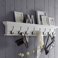 Easily attach the coat rack to your entryway wall. Wall Rack With Hooks And Shelf Off 54