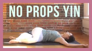 Beautiful woman practicing yoga, seated forward bend, paschimottanasana. Yin Yoga Without Props Full Body Yin Yoga For Beginners Youtube