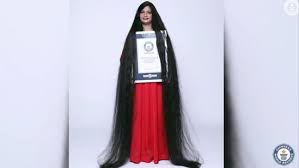 world record with 7 ft 9 in long hair