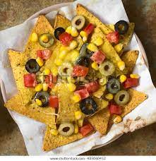 Baked Nachos With Cheese And Vegetables Stock Photo Ildi Papp  gambar png