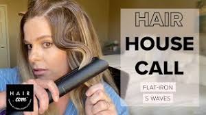 get tousled beach waves with a flat iron