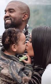 Kim kardashian cuddles her 3 kids: Photos From Kim Kardashian Kanye West S Cutest Moments With Their Kids E Online