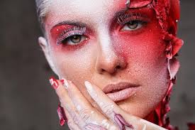 model with exotic red and white makeup