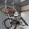 This black ceiling bike lift uses a rope and pulley system that is mounted to the top of. Https Encrypted Tbn0 Gstatic Com Images Q Tbn And9gcs4 Wplnncpjripqmofbfaivt2gary2xb201aqmqfnbkt1x Fjc Usqp Cau