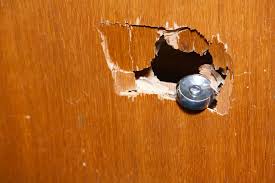 how to fix a hole in a door an easy