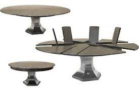 Round dining tables can be used not only as a dining table but also as coffee table, breakfast table, kitchen table, bar table, etc. Modern Jupe Table Expandable Round Dining Table With Self Storing Leaves Seat 10 Ebay