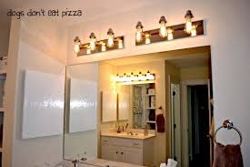 How To Update Bathroom Lighting It S As Easy As Changing A Lightbulb Dogs Don T Eat Pizza