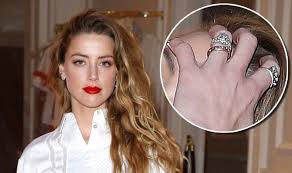 People reports that heard and depp officially tied the knot last night, in a civil ceremony at their home in los angeles. Amber Heard Shows Off Her Dazzling Ring At First Appearance Since Marrying Johnny Depp Celebrity News Showbiz Tv Express Co Uk