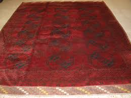 antique red afghan carpet with