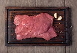 wood or plastic cutting board for meat