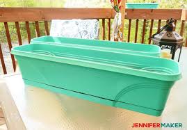 You put plastic bags through the top opening and pulled out plastic bags from the bottom opening. How To Spray Paint Plastic Planters Jennifer Maker