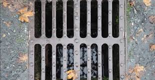 Unblock Outside Drain Grates And Pipes