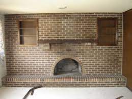 full wall of brick on a 1970s fireplace