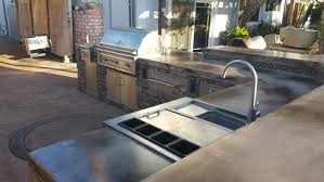 Modern luxury features include an outdoor kitchen with outdoor seating, a fire pit and water elements such as an infinity pool or koi pond. Custom Outdoor Kitchens In Rocklin Ca Luxury Outdoor Kitchens