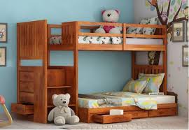 A bunk bed is a type of bed in which one bed frame is stacked on top of another, allowing two or more beds to occupy the floor space usually required by just one. Bunk Bed Upto 55 Off Buy Bunk Beds For Kids Online Woodenstreet