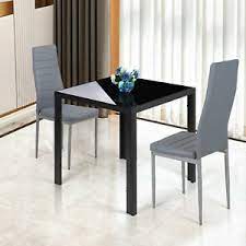 This modern small square black glass dining table and 2 black faux leather dining chairs consists of a black glass table top with elegant chrome table legs and will clearly be the focal point to your dining room. Glass Dining Table 2 Seats Table Chair Sets For Sale Ebay