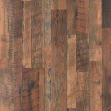 quickstep studio spill repel restoration oak 12 mm t x 7 in w x 48 in l waterproof wood plank laminate flooring 19 63 sq ft carton in brown