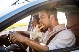 is it illegal to eat and drive