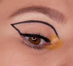 graphic eyeliner with a hint of color