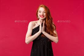 pleased cheerful young redhead woman