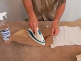 remove candle wax from carpet with a