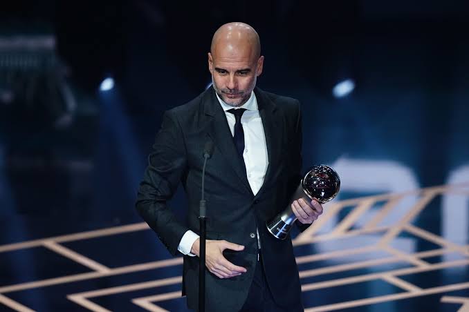 Pep Guardiola with the FIFA The Best Men's Coach award