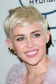 Swept back from the face and slicked back tightly at the sides for a masculine/feminine evening look. Hair Envy Of The Day Miley Cyrus S Platinum Pixie Short Blonde Hair Hair Styles 2014 Pixie Haircut