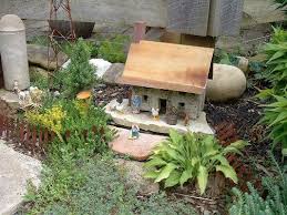 Fairy Garden With Diy Stone Fairy Houses