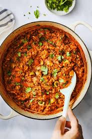 The chicken and rice are simmered with onions, peppers and tomatoes until the meat is infused with flavor. Arroz Con Pollo Recipe Pinch Of Yum
