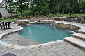Freeform Pool Spa With Stone Retaining Wall