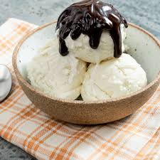 homemade ice cream with chocolate sauce