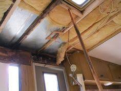 First, on the inside of your roof, spread the tar into the hole using a putty knife. How To Repair Severe Water Damage In Your Camper Or Rv Full Detailed Article With Lots Of Photos Also A Support Camper Repair Vintage Camper Camper Trailers