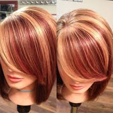 This hairstyle looks like black hair with red highlights. Blonde With Red Highlights For Black Women New Natural Hairstyles