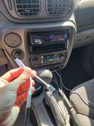 Is there ANY way I can play music from my phone onto my car stereo? I have  a Samsung S215g, Samsung didn't see it fit to put an aux jack into the phone  . I have tried: USB connection from phone to stereo, doesn't work. Also  tried USB-c from phone to audio