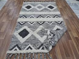 white wool hand woven rug
