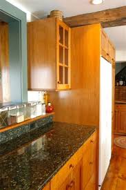Kitchen cabinets are standard at 24 in depth. Thirty Inch Deep Base Cabinets